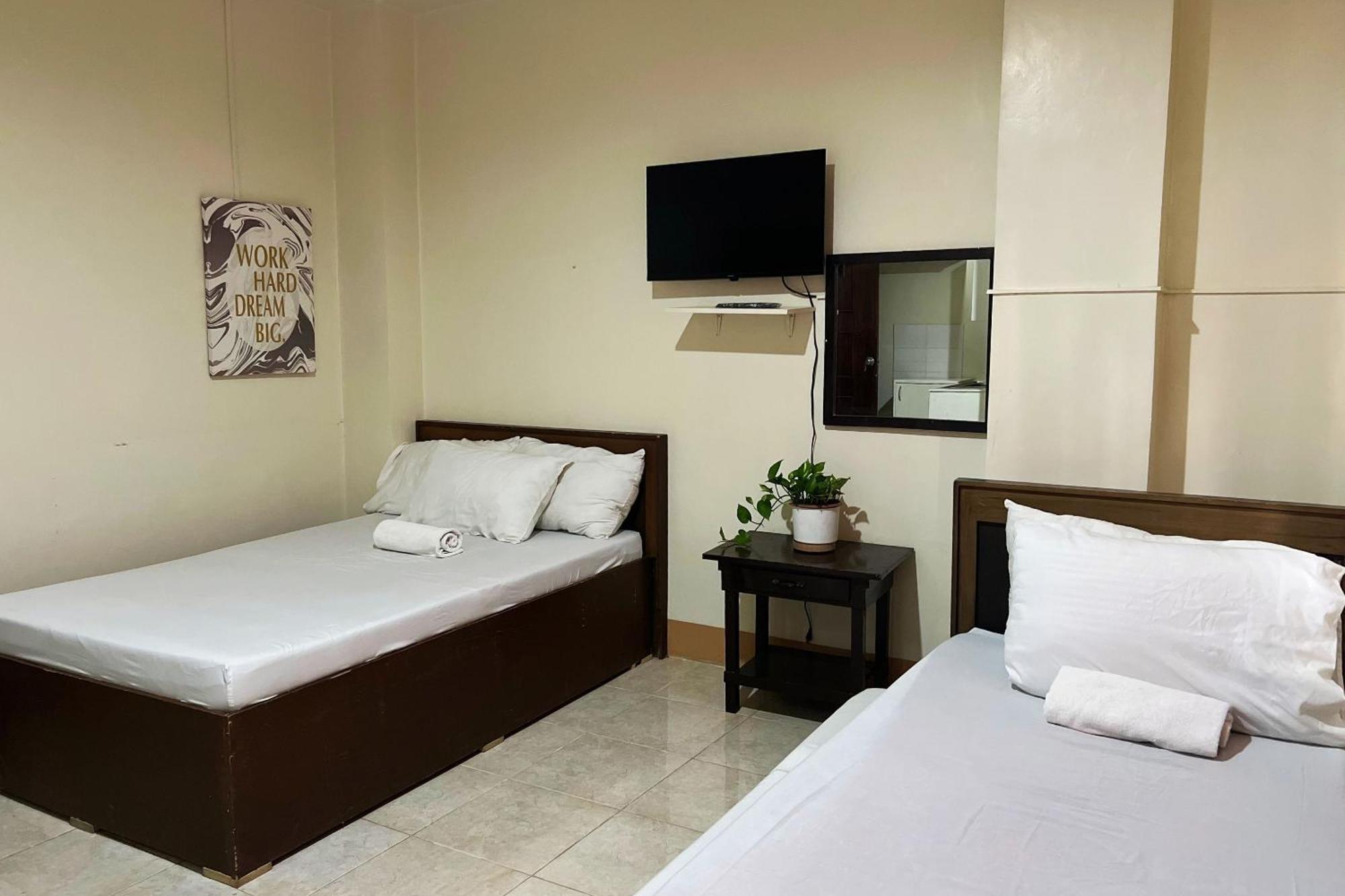 Sta Rosa Inn Iloilo Powered By Cocotel Chambre photo